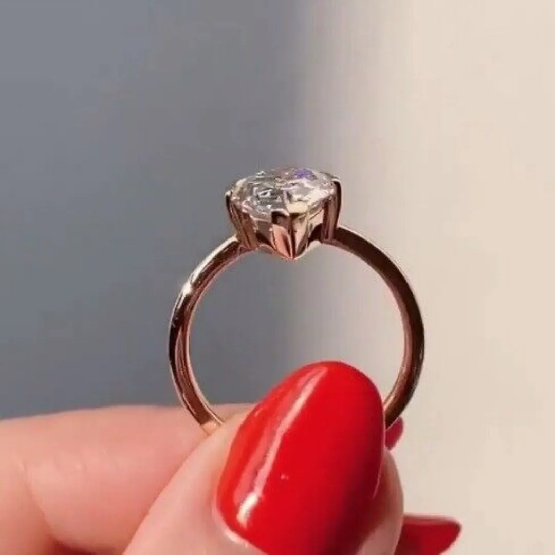 /public/photos/live/Crushed Ice Pear Cut Singular Moissanite Ring 666 (2).webp